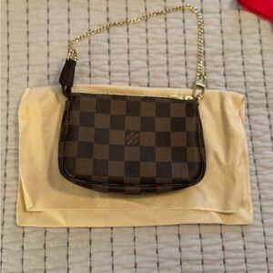 Louis Vuitton Mini Pochette in Damier Ebene
